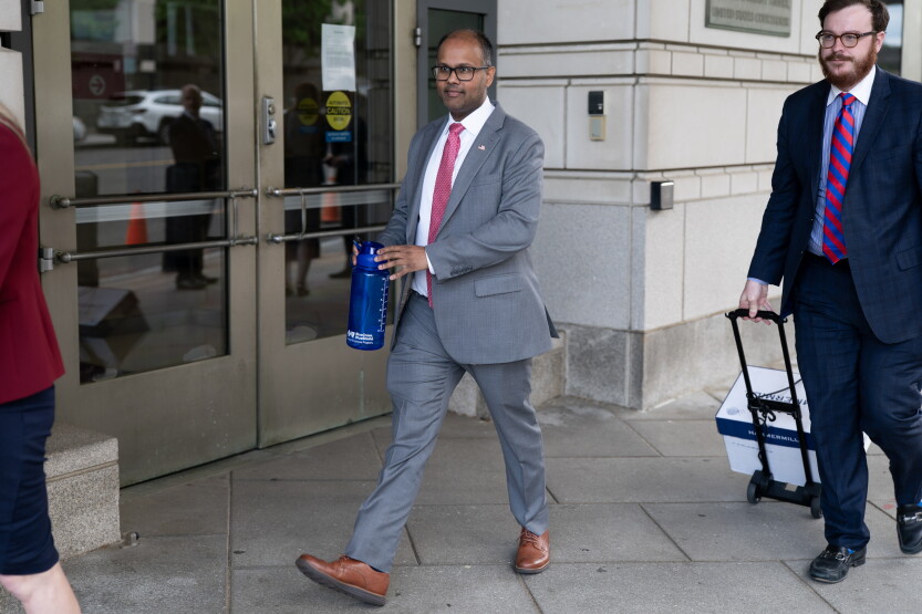 Abhishek Kambli, then Deputy Associate Attorney General at the U.S. Department of Justice, departs following a hearing at the E. Barrett Prettyman United States Court House on Thursday, May 14, 2026.